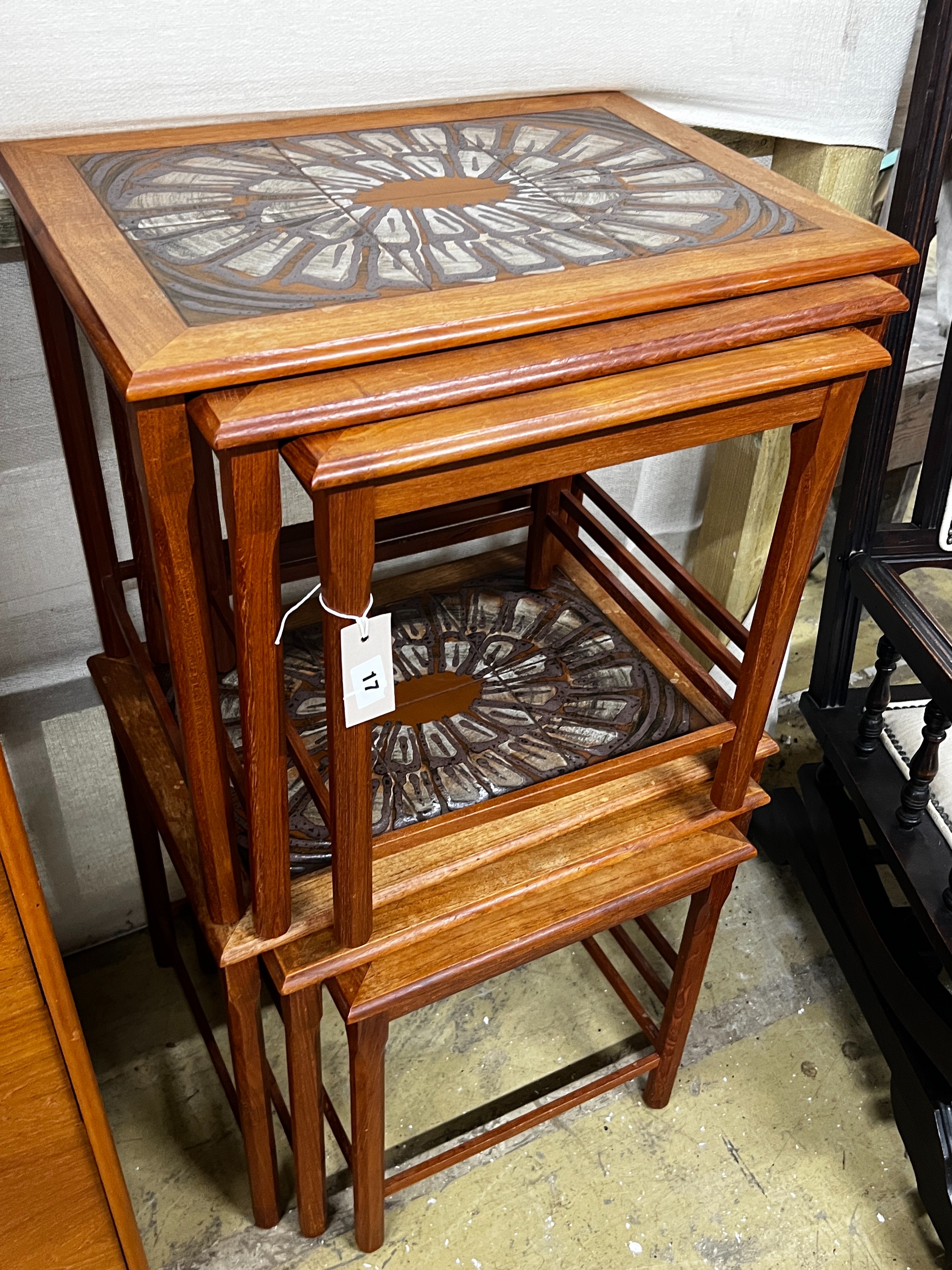 Two mid century tiled top teak nests of tables by Toften Mobelfabrikken, Denmark, width 55cm, depth 40cm, height 47cm